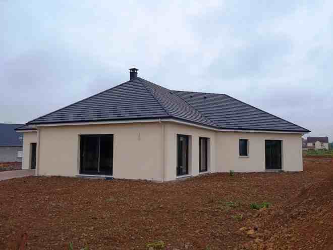 Travaux d'agrandissement de maison et aménagement de combles complet avec velux